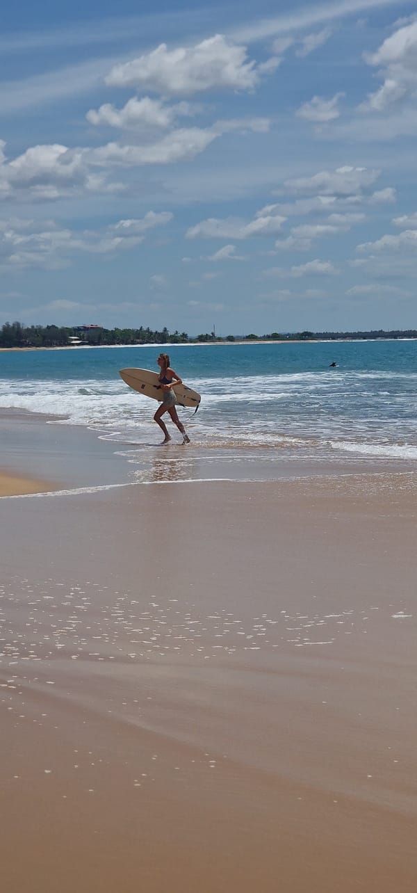 Morning surf session draws crowds to Arugam Bay beach