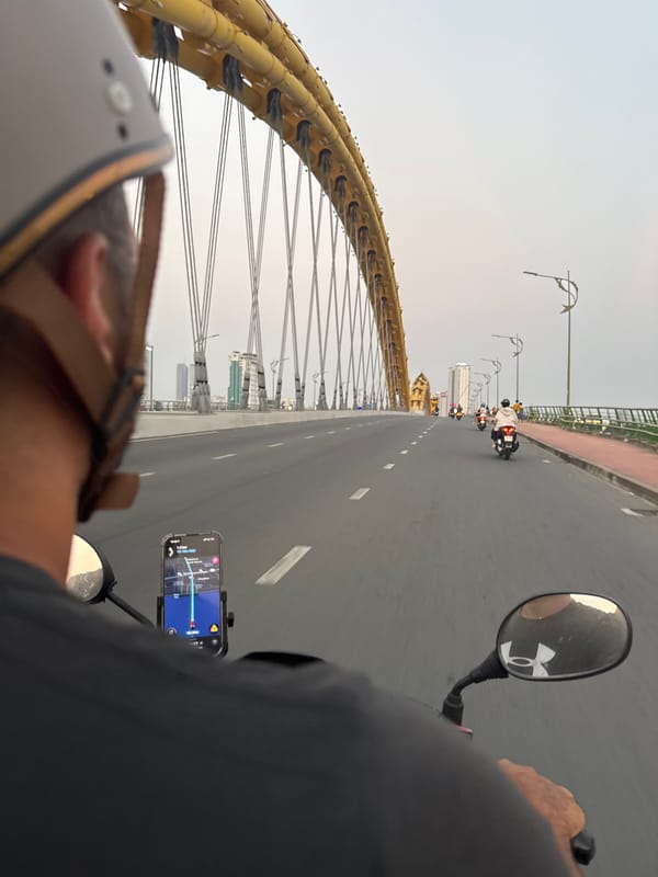 Motorcyclist crosses Dragon Bridge in Đà Nẵng, Vietnam