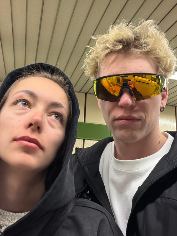 Two people capture tilted selfie in Chuo, Japan