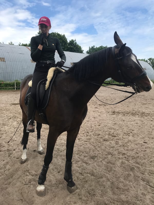 Horse training session documented at Kharkiv equestrian facility