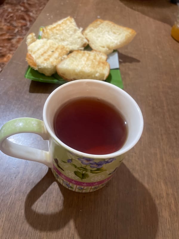 Morning coffee and grilled bread captured in Yerevan