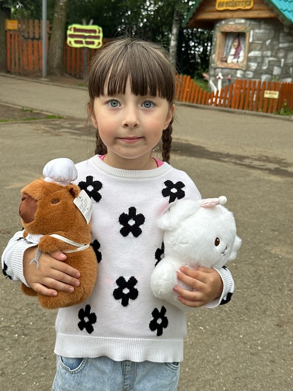 Afternoon at a Chaikovsky park with animals and fairground attractions