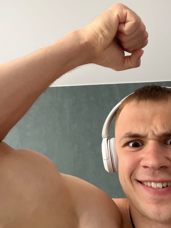 Selfie series: flexing and goofing around with white headphones