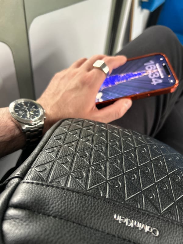 Person views blue light image on phone in Briesen