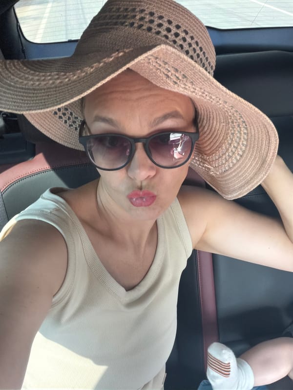 A summer outing in Chaikovsky, car selfie and stroller in tow