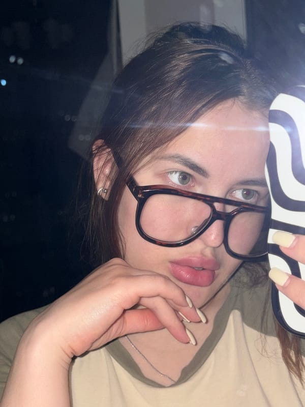 Woman with striped object observed indoors at night in Shendzhii