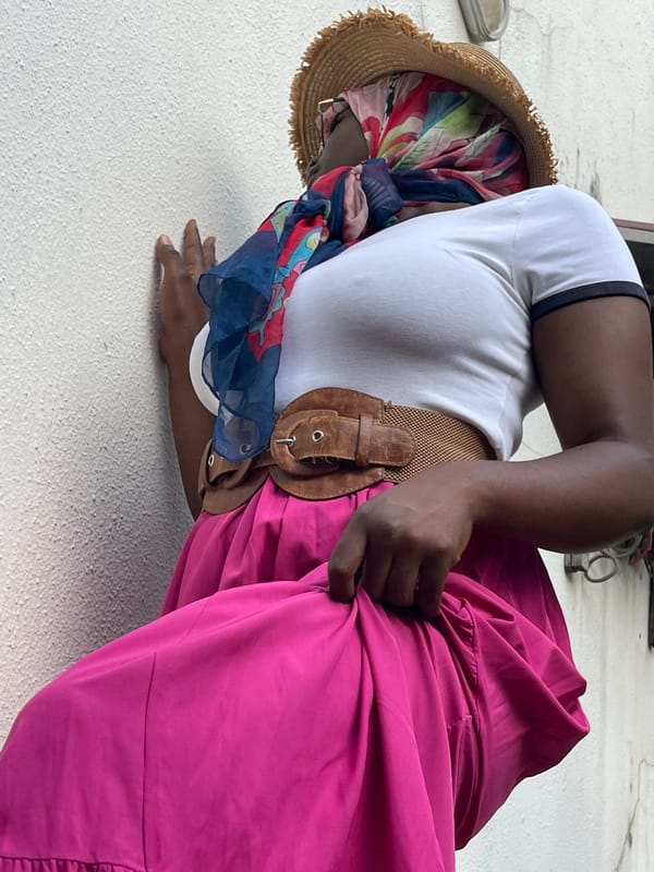 Woman poses for photos in Gwarinpa Nigeria neighborhood
