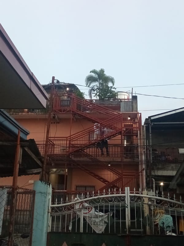 Quiet evening in a Davao City neighborhood, tricycles and all