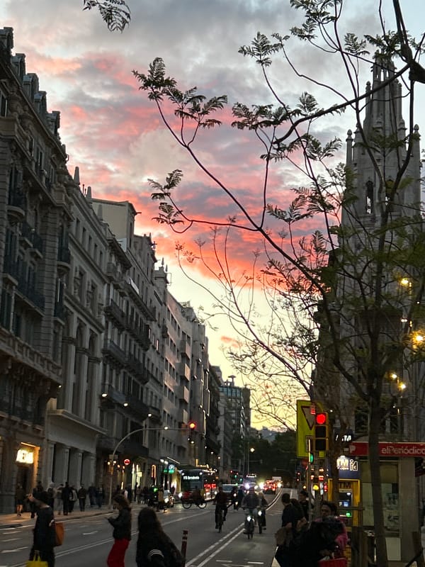 Dusk street scenes captured in Barcelona showing sunset sky