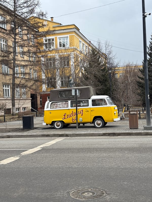Morning documentation of Krasnoyarsk locations including cafes and landmarks