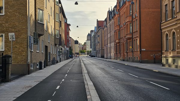 Cobblestone street and historic facades in central Linköping