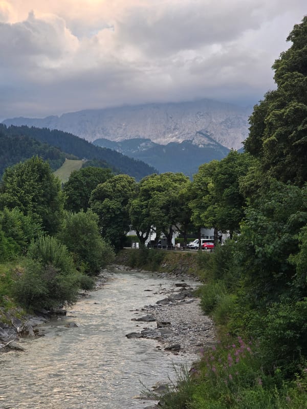 Garmisch-Partenkirchen rivers and Alpine village scenery on a grey summer evening