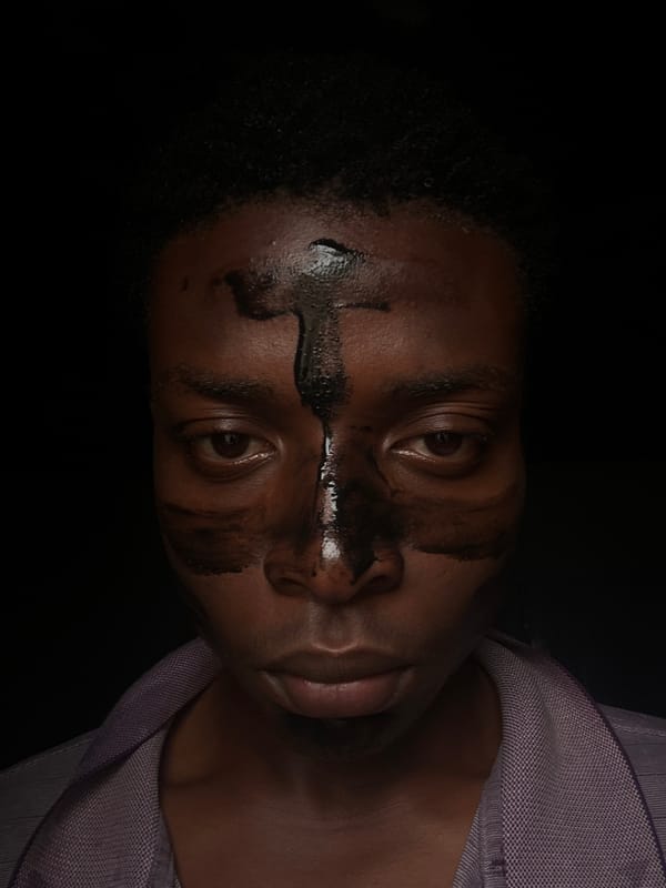 Person applies facial mask during morning routine in Bukuru