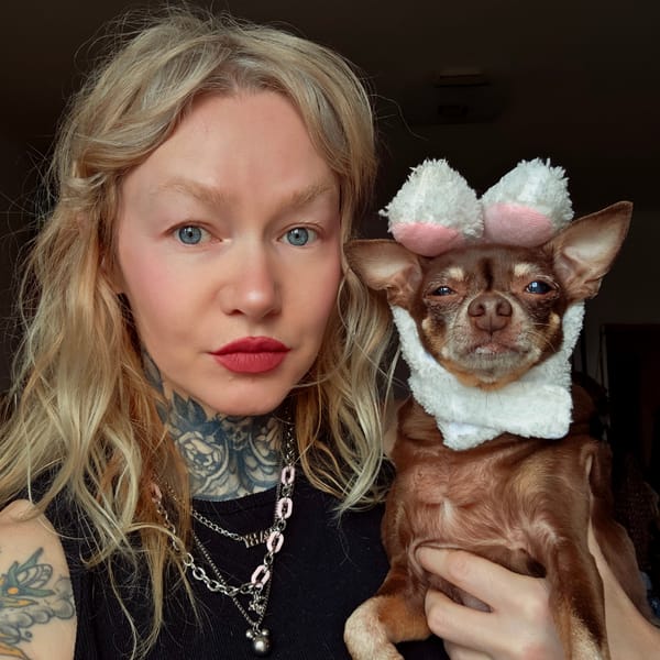 Woman and dog rest together indoors in Saint Petersburg