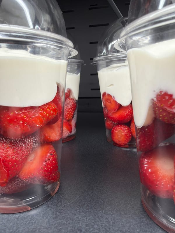 Fresh strawberry desserts and seedlings at a Saint Petersburg café