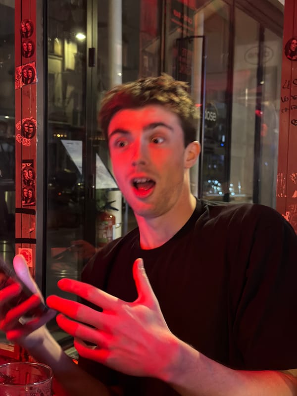 Man makes silly face for camera in Paris