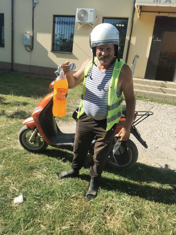 Morning moments in Carbuna: scooter, soda, and a flamingo dress
