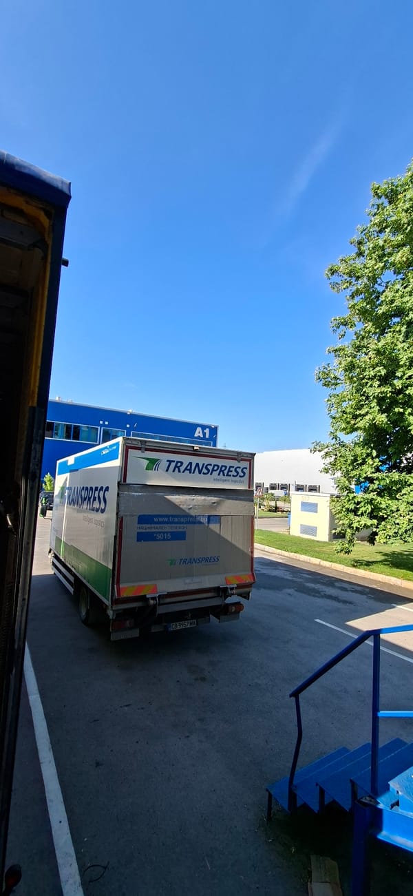 Trucks and warehouse at a Varna industrial site
