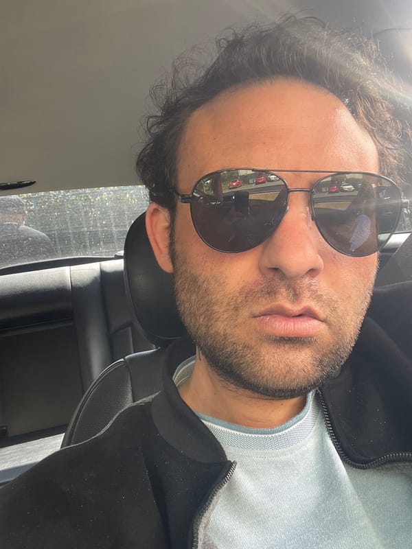 Man in sunglasses observed in parked car, Portadown