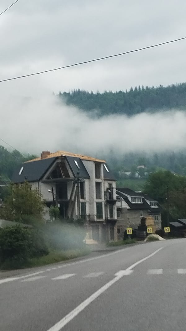 Modern building photographed in hazy Yaremche, Ukraine