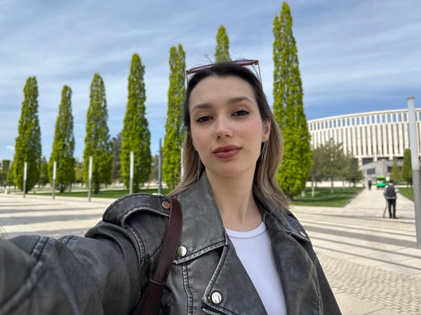 Morning outdoor photography captures woman, art installations, urban spaces