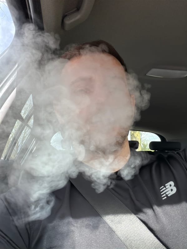 Person vaping in vehicle captured in London