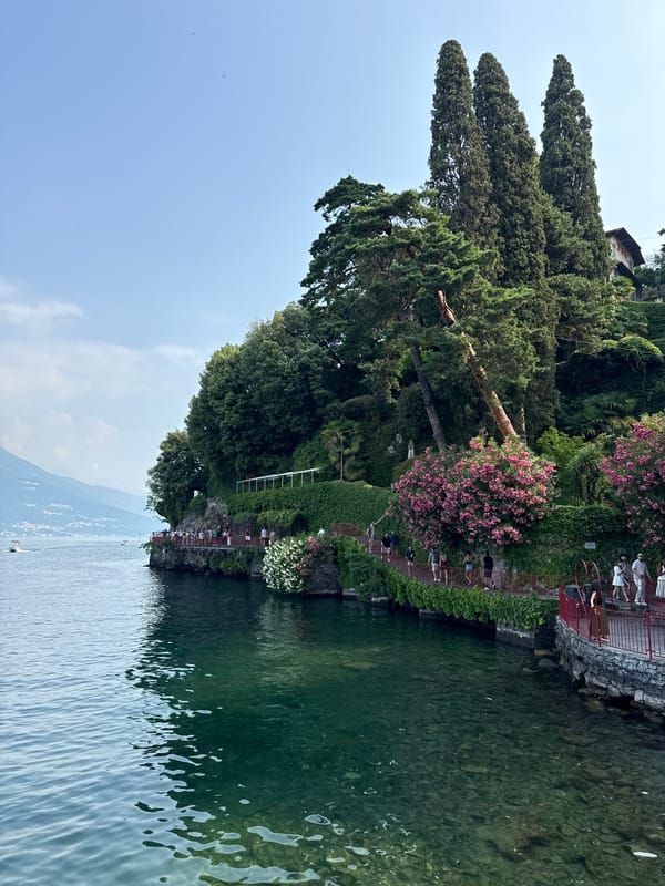 Varenna's Lake Como waterfront buzzing on a clear summer morning