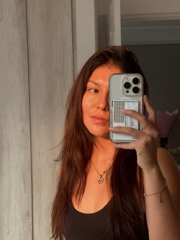Woman takes mirror selfies in San Francisco Ocotlán, Mexico