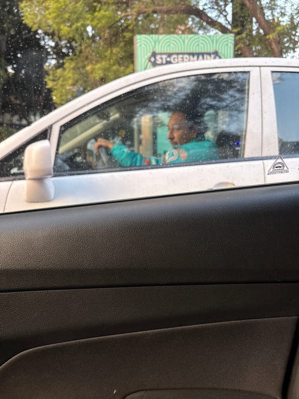 Traffic scene captured from car window in Mexico City