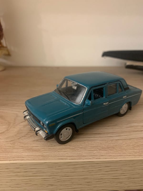 Toy cars and decorative collectibles on display in Kutaisi