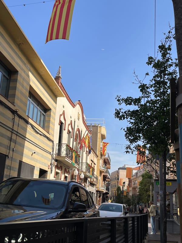 Morning scenes captured in Montcada: Catalan flags, administrative office