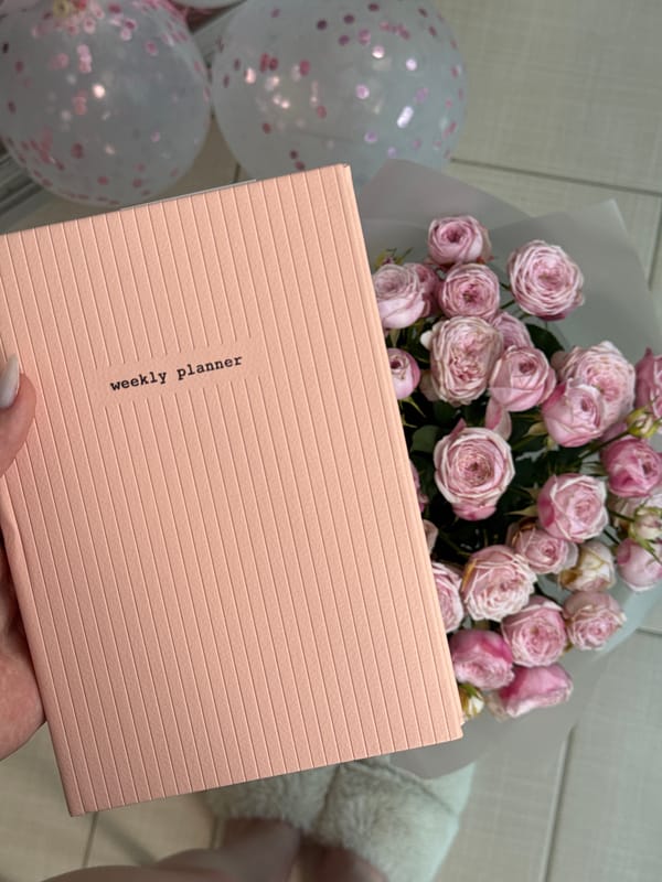 Birthday gift haul with a MacBook, roses, and Marshall speaker