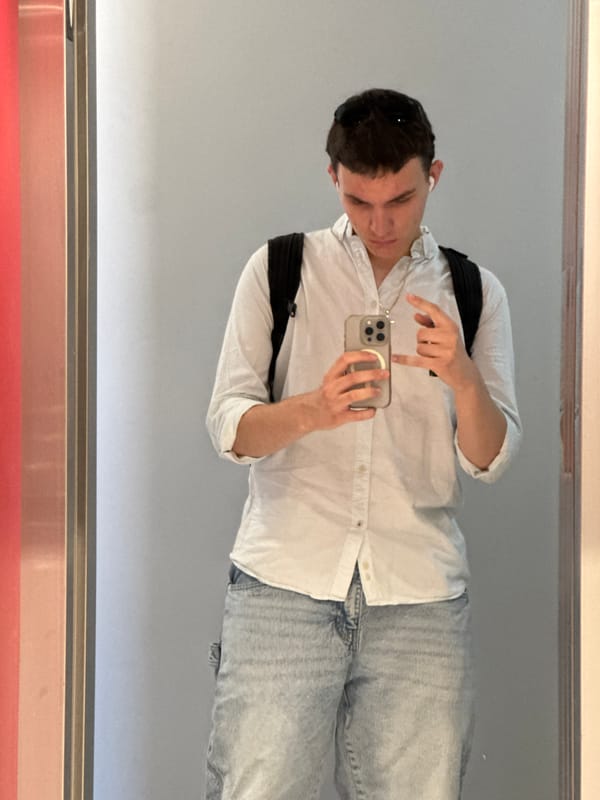 Young man takes elevator selfies in Sofia