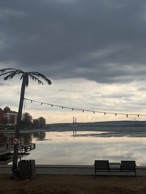 Woman documents leisurely afternoon at Votkinsk waterfront recreation area