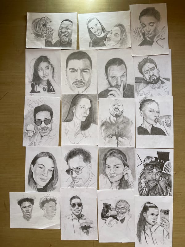 Artist displays portrait sketch collection on wooden floor in Jos