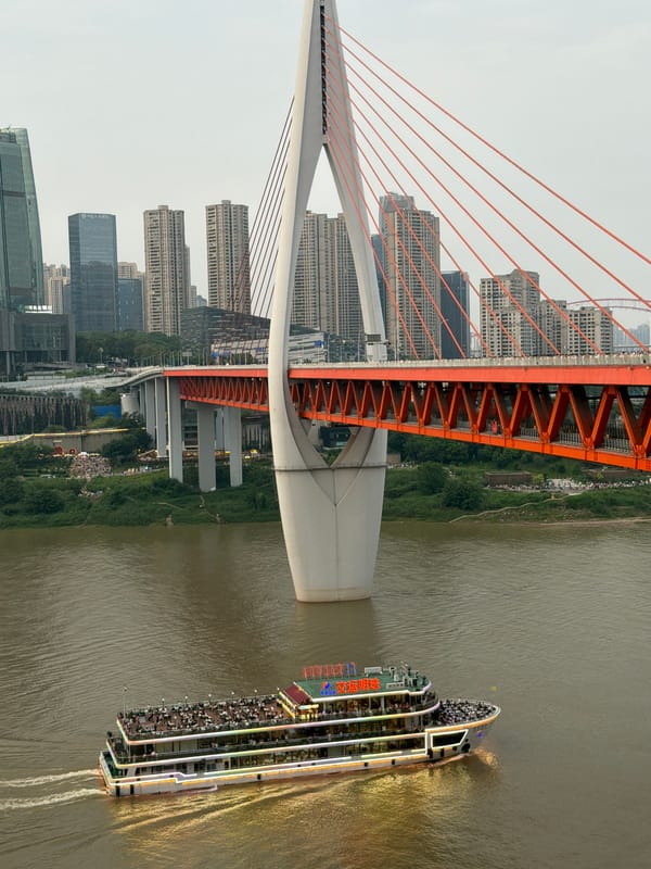 Chongqing's Yuzhong riverfront and city streets, mid-morning