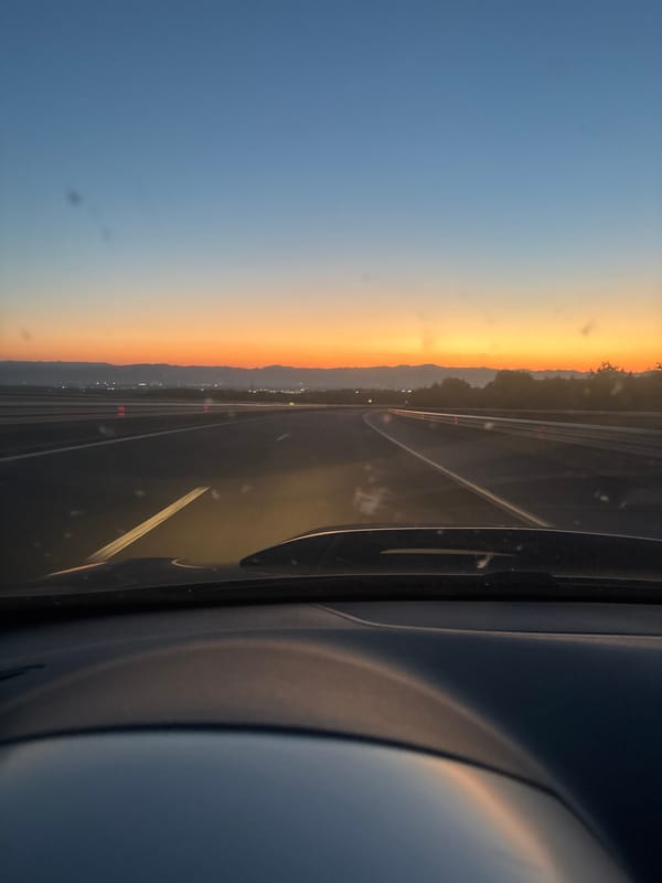 Dawn sky captured from vehicle in Bulgarian town