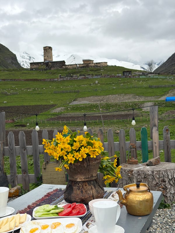 Traditional breakfast served outdoors in medieval Georgian mountain village