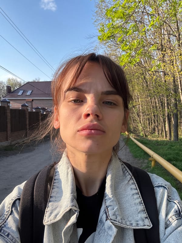 Woman takes selfies in Rostov park, dog spotted nearby