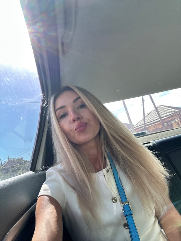 Woman documents afternoon selfie session in Armavir, Russia