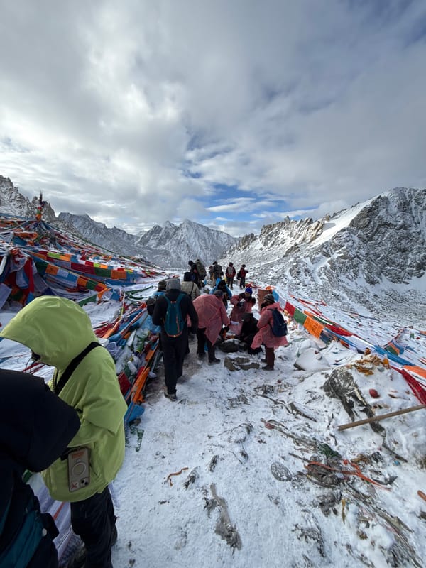 Pilgrims perform spiritual rituals on snowy Chinese mountain pass