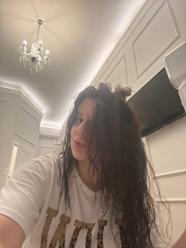 Person takes selfie with damp hair in Krakow