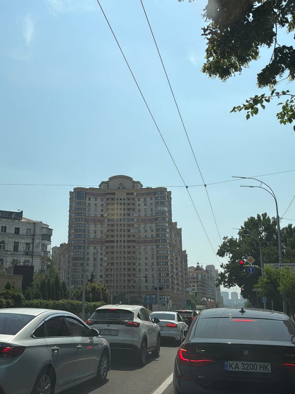 Kyiv streets show war damage alongside everyday traffic