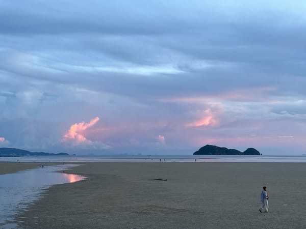 Sunset on a quiet Koh Phangan beach, sky and sea on fire