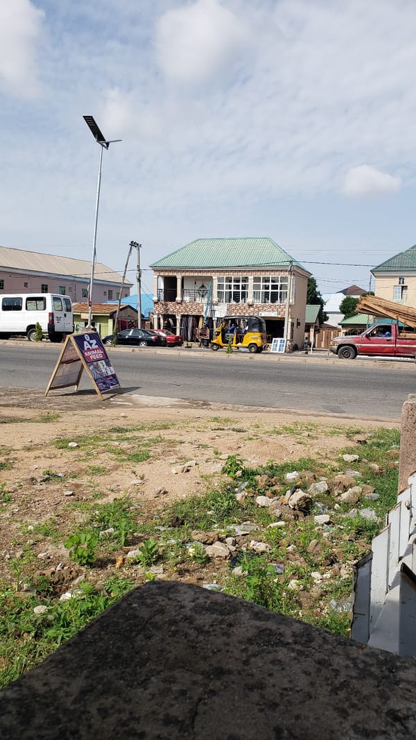 Street, barbershop, and candy shop scenes from Jalingo, Nigeria