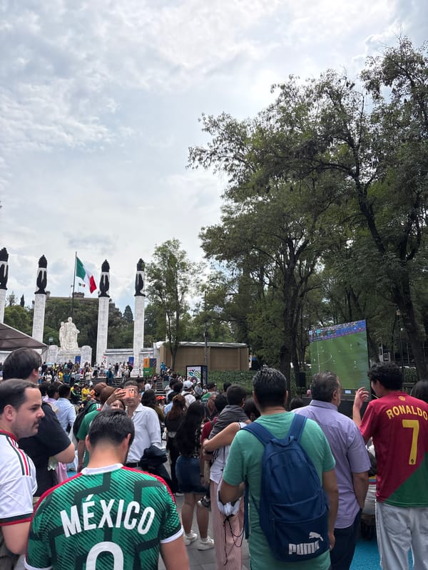 Mexico City crowd watches live soccer at Monument to the Revolution