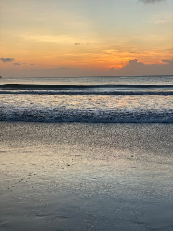 Sunset beach leisure activities captured at Kuta Selatan, Indonesia