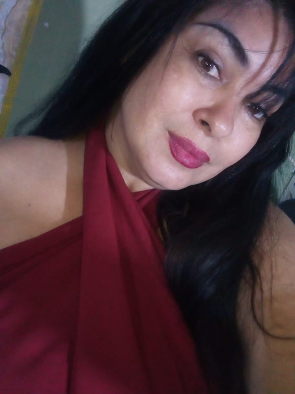 Woman performs indoor singing session in Juan Griego
