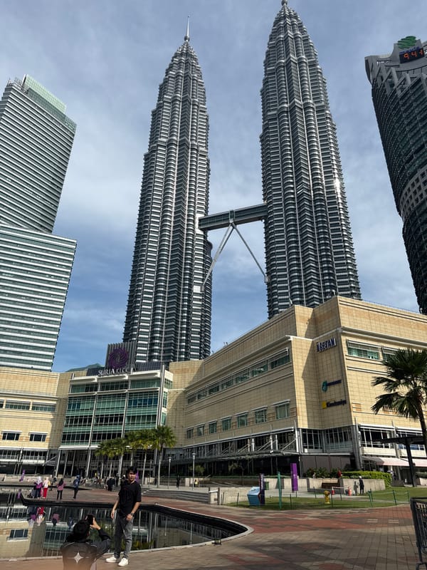 Late night tourist activity captured at Petronas Towers complex