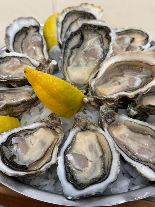 Fresh oysters served with champagne in Paris dining scene